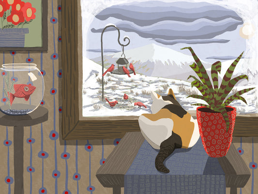 A calico cat gazes out a window at a snowy scene of red birds feeding at a bird feeder. Inside with the cat are a fish in a fishbowl and a plant.
